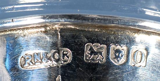 An Edwardian Arts & Crafts planished silver waisted napkin ring, by Omar Ramsden & Alwyn Carr, Height 55mm weight 1oz/33grms